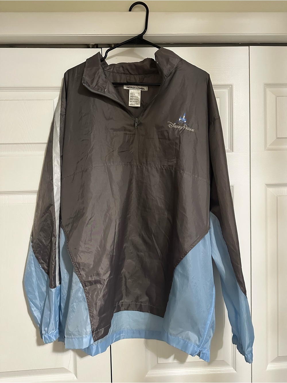 Unisex Disney Parks Lightweight Rain Pullover Jacket in Charcoal & Light Blue.